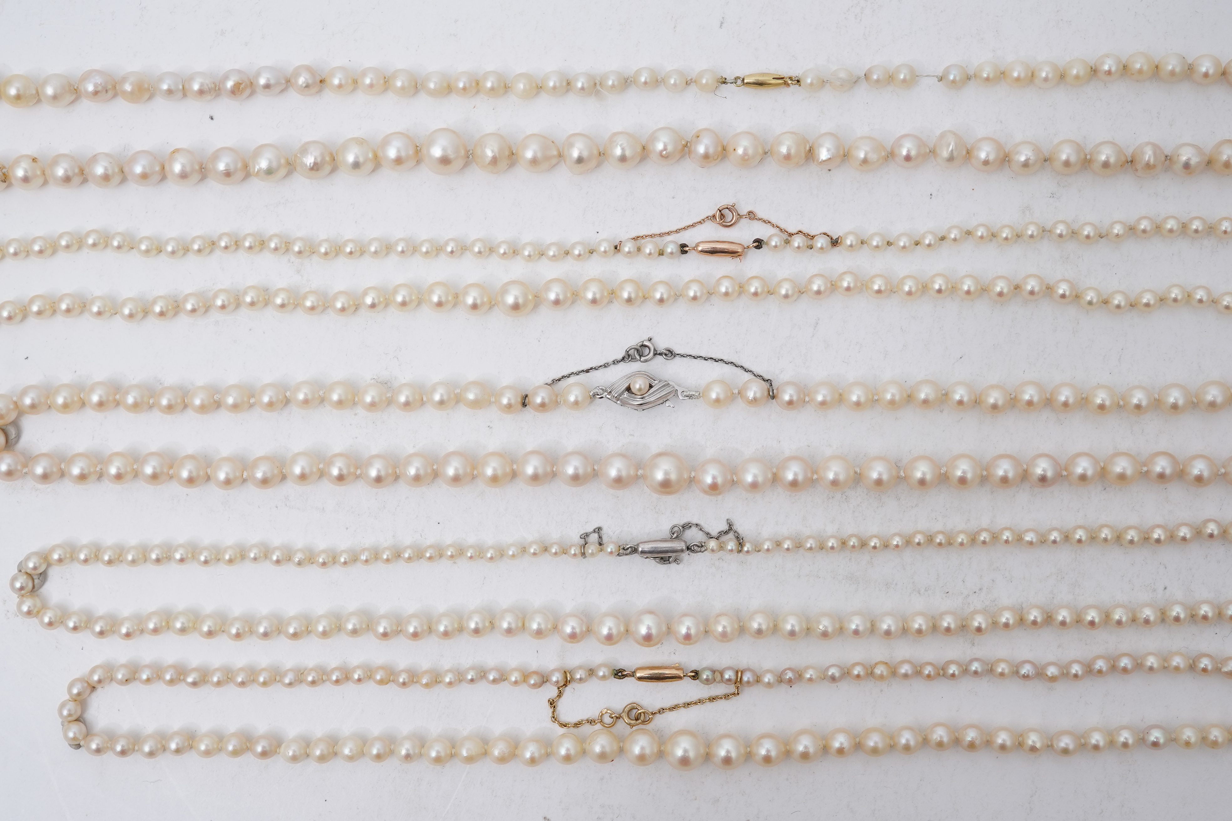 Five cultured pearl necklaces